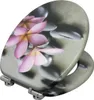 A toilet seat with a floral and stone design. Produktbild-Vorschau