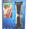 Product packaging for a Philips Bodygroom Series 7000, featuring an image of a man using the product and a close-up of the device. Podgląd zdjęcia produktu