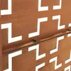 A close-up view of a weathered metal screen with a geometric cut-out pattern. Náhled obrázku produktu