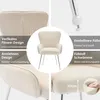 A collage of images showcasing a beige armchair with silver legs, highlighting its features. Náhled obrázku produktu