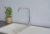 A modern kitchen sink with a chrome faucet and a small potted plant. Produktbild-Vorschau