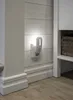 A night light plugged into a wall outlet. Podgląd zdjęcia produktu