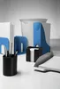 A collection of office supplies arranged on a white surface. Náhľad obrázku produktu