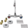 A chrome-plated faucet with red and blue knobs, along with various plumbing accessories, is displayed against a white background. Produktbild-Vorschau