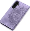 A close-up, angled view of a purple phone case with a mandala design embossed on it. Produktbild-Vorschau