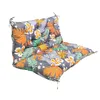 A cushion with a tropical leaf and flower pattern on a white background. Voir les images du produit