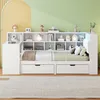 A modern white bed with a built-in bookshelf and storage drawers, decorated with various items. The background wall is split into yellow and green. Produktbild-Vorschau