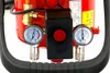 Close-up view of an air compressor's control panel with two pressure gauges. Náhľad obrázku produktu