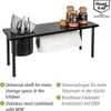 A black kitchen shelf with a paper towel holder, cutlery holder, and spice jars. Náhled obrázku produktu