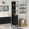 A modern bathroom with a black vanity, sink, and a tall black storage cabinet. Anteprima dell’immagine prodotto