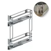 A wireframe kitchen cabinet pull-out organizer with two shelves and drawer slides, shown against a white background. A small circular inset shows the organizer installed in a kitchen cabinet, holding bottles. Voir les images du produit