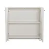 A white sideboard with two doors open, revealing two shelves inside. The background is plain white. Podgląd zdjęcia produktu