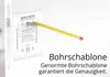 A drilling template is shown attached to a door, with a pencil marking a point. Produktbild-Vorschau