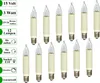 A collection of small, candle-shaped light bulbs with cream-colored bases and clear glass tops, arranged in rows on a white background. Text labels are present on the left side of the image. Produktbild-Vorschau