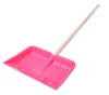 A pink snow shovel with a wooden handle against a white background. Voir les images du produit