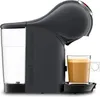 A gray Nescafé Dolce Gusto coffee machine with a cup of coffee. Produktbild-Vorschau