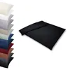 A black duvet cover and pillowcase set is shown on a white background, with a stack of other colored bedding sets to the left. Produktbild-Vorschau