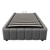 A gray upholstered bed frame with a slatted mattress base, shown from a front diagonal view against a white background. Voir les images du produit