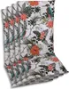 A stack of four chair cushions with a tropical bird and floral pattern. Produktbild-Vorschau