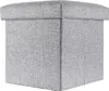 A gray fabric storage ottoman with a lid, shown from a three-quarter angle against a white background. Náhled obrázku produktu