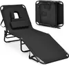 A black foldable lounge chair with a face opening and a removable cushion is shown. A folded version of the chair is visible in the background. Produktbild-Vorschau