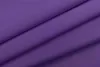 A close-up view of folded purple fabric, likely curtains, with soft lighting. Produktbild-Vorschau