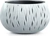 A white, textured planter pot with a black interior. Náhľad obrázku produktu