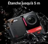 A black action camera is shown partially submerged in water, with water splashing around it. There are also some brown debris particles in the water. Náhled obrázku produktu