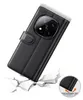 A black leather flip case for a smartphone is shown, angled and tilted, with a cracked ground effect at the bottom, suggesting durability. Produktbild-Vorschau