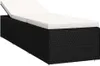 A black rattan sun lounger with a white cushion, shown from a side-diagonal angle. Náhľad obrázku produktu