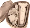 A Braun Silk-épil 9 epilator and its accessories are neatly arranged inside a beige fabric storage pouch. Náhľad obrázku produktu