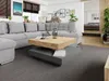 A modern living room with a large sectional sofa and a contemporary coffee table. Anteprima dell’immagine prodotto