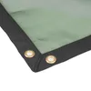 A close-up view of the corner of a green tarp or net with reinforced black edging and metal grommets. Produktbild-Vorschau