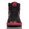 A front view of a black and red Adidas high-top sneaker. Podgląd zdjęcia produktu