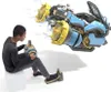 A young person is playing a video game with a Nintendo Labo Toy-Con vehicle set. Produktbild-Vorschau