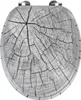 A toilet seat with a wood grain pattern. Produktbild-Vorschau