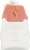 The back view of a white sneaker with a pink suede accent on the heel. Produktbild-Vorschau