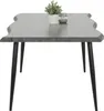 A table with a plant and a jar on it, set against a white background. Produktbild-Vorschau