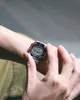 A person's wrist wearing a digital watch. Náhled obrázku produktu
