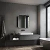 A modern bathroom with a vanity, sink, mirror, and bathtub. Anteprima dell’immagine prodotto