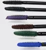 A close-up, studio shot of several mascara wands with different colored mascara applied. Náhled obrázku produktu