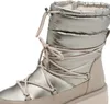 A close-up view of a beige and silver women's boot. Produktbild-Vorschau