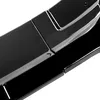 Close-up view of a shiny black product, showing seams and polished surfaces. Náhled obrázku produktu