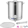 A stainless steel brewing kettle with accessories laid out in front of it. Voir les images du produit