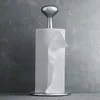 A silver paper towel holder with a roll of white paper towels on a gray textured background. Produktbild-Vorschau