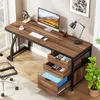 A home office setup with a desk, computer, and chair. Podgląd zdjęcia produktu