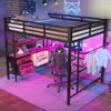 A loft bed with a desk and gaming setup, illuminated by pink LED lights. Náhled obrázku produktu