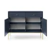 A dark blue sideboard with two doors and two drawers, set against a white background. The sideboard has gold legs and gold drawer handles. The doors are open, revealing shelves inside. Podgląd zdjęcia produktu