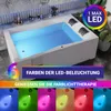 A bathtub with blue water and LED lighting, showcasing different color options. Produktbild-Vorschau