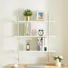 A white wall-mounted shelf unit with decorative items and books. Podgląd zdjęcia produktu